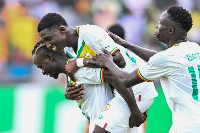Senegalese players jubilating after a goal