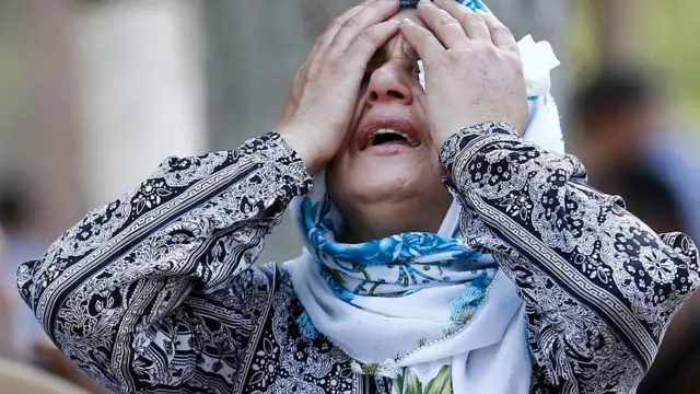 Saldırıda yakınlarını kaybeden bir kadın