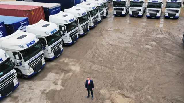 Andy Scott with the lorries of one of his haulage firms