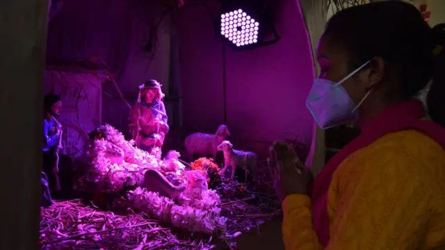 People during the Christmas Mass, in Kolkata, India, on December 25, 2020 amid the Covid-19 pandemic.