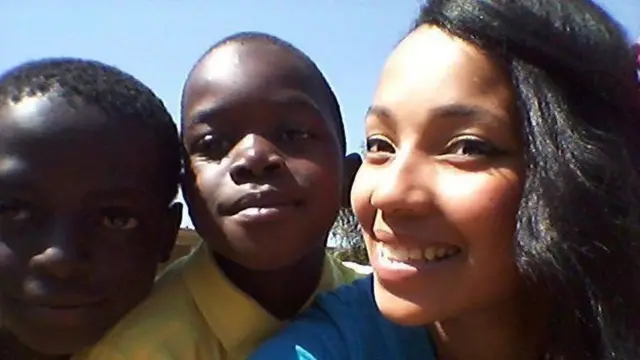 Michillay Brown and two school kids