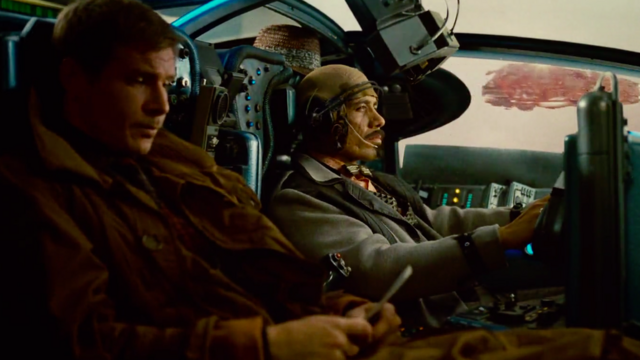 Рік Декард (ліворуч) з офіцером Гаффом у летючій автівці