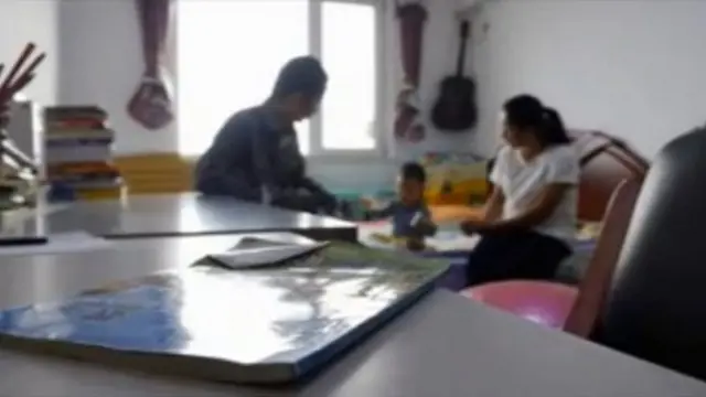 குடும்பத்தினருடன் ஷிய யான் இ