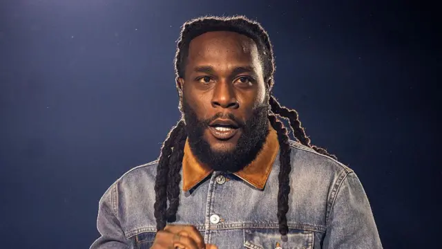 Burna Boy dey perform during in tour for Atlanta, Georgia