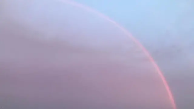 Pink rainbow over Dorchester, Dorset