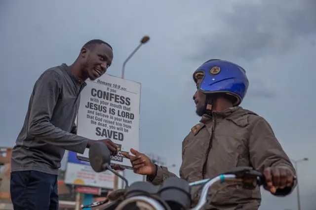 Man talking to a passer-by