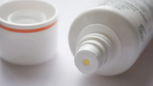Tube of cream with lid off