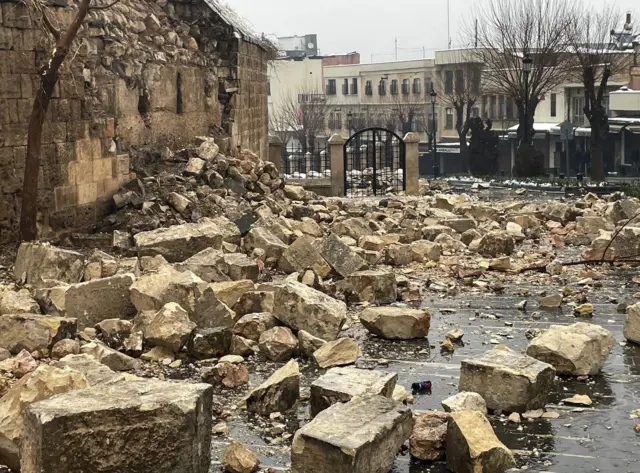 Rubble lines the street outside Gaziantep Castle