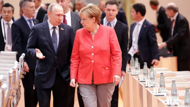Володимир Путін та Ангела Меркель