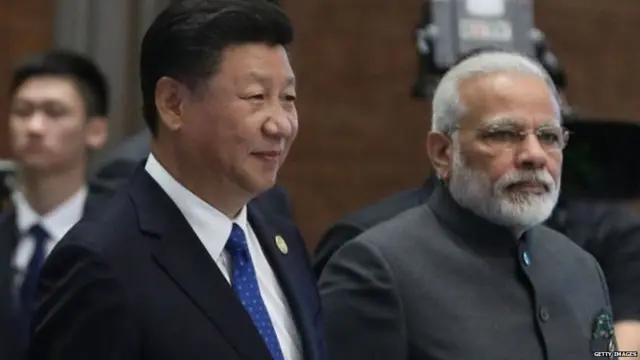 શી જિનપીંગ અને નરેન્દ્ર મોદી