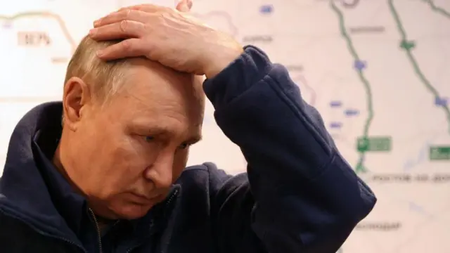 путін
