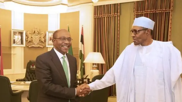 Nigeria President Muhammadu Buhari and Govnor of di Cental Bank of Nigeria Godwin Emefiele