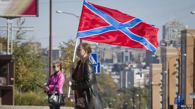 The Novorossiya, the internationally unrecognised flag of the Donetsk and Luhansk regions, being flown in Donetsk in October 20 14