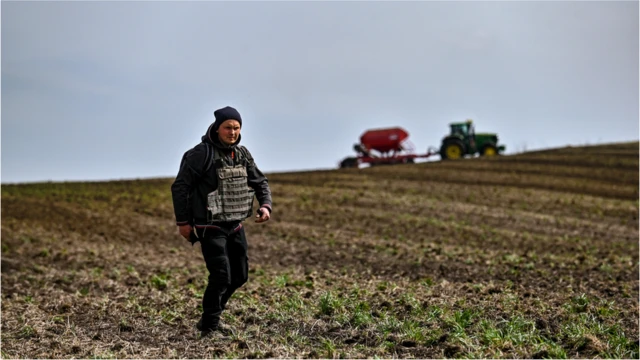 Farmer in flack jacket