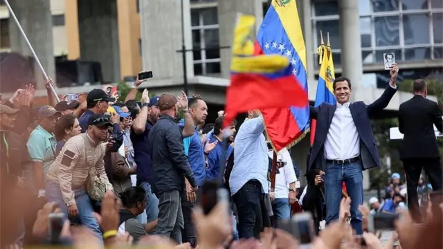 Juan Guaidó acena ao públicolucky slots paga mesmoeventolucky slots paga mesmojaneiro,lucky slots paga mesmomeio a bandeiras da Venezuela