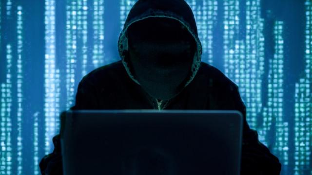 Imagemslot clube 777homem usando capuz atrásslot clube 777um tecladoslot clube 777laptop