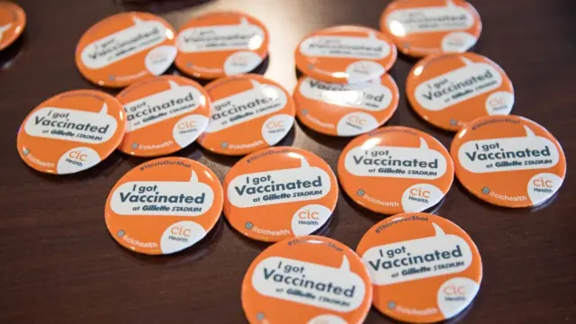 Pins for people who have been vaccinated at Gillette Stadium&#x27;s vaccination site on January 15, 2021 in Foxborough, Massachusetts