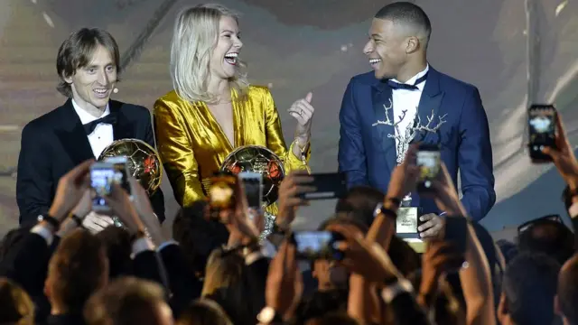 Luka Modric wit Ada Hegerberg and Kylian Mbappe