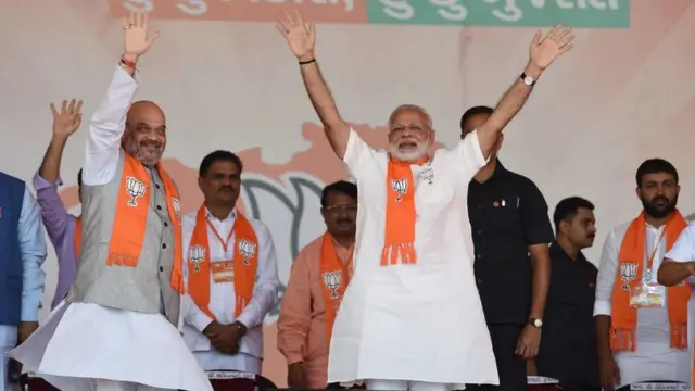 નરેન્દ્ર મોદી અને અમિત શાહની તસવીર