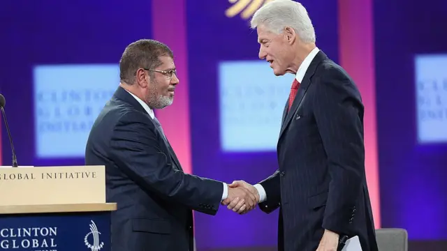 بیل کلینتون و محمد مرسی