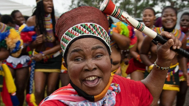A woman wit traditional Zulu headgear for Nongoma, South Africa - 17 March 2021