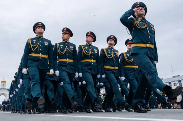 Servicemen march during a Victory Day military parade