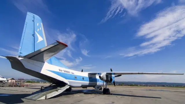 Ан-2 перед работой по ликвидации лесного пожара