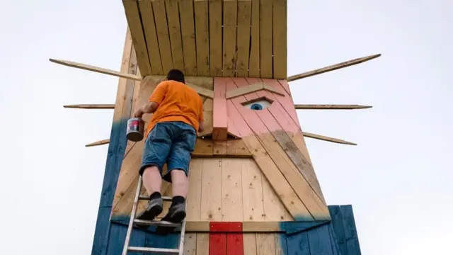 A wooden statue of President Trump was torched in January