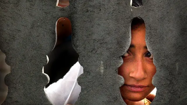 এক নারীর মুখ