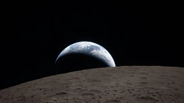 Зображення заходу Землі на фоні поверхні Місяця