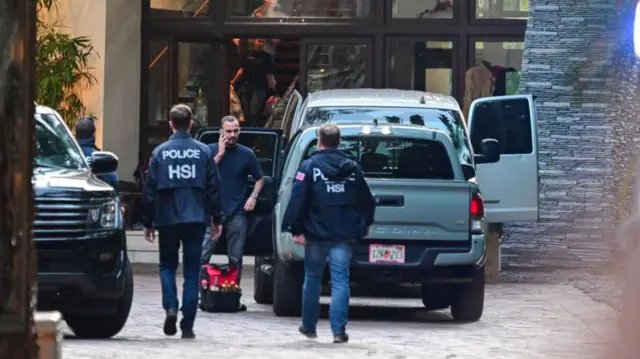 Police outside Combs's home at Star Island in Miami Beach on 25 March, 2024