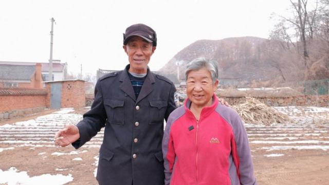 Huanchun Cao y su esposa