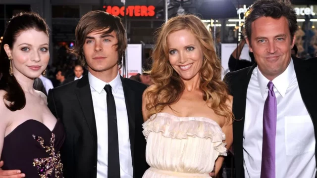 Perry with actors Michelle Trachtenberg, Zac Efron, Leslie Mann
