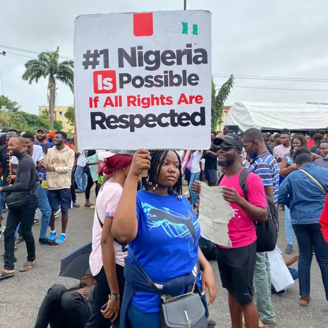 One protester carry placard