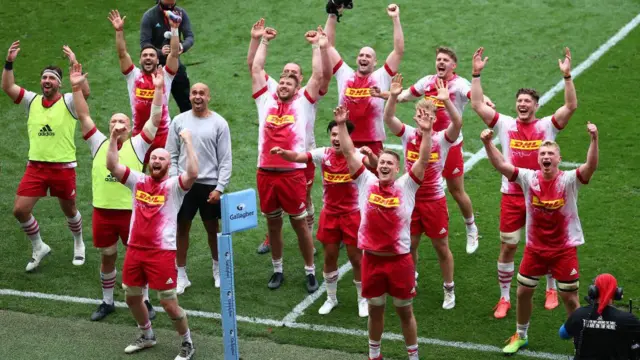 Harlequins players salute their fans high in the Ashton Gate stands after an astonishing 43-36 extra-time victory over Bristol in 2021