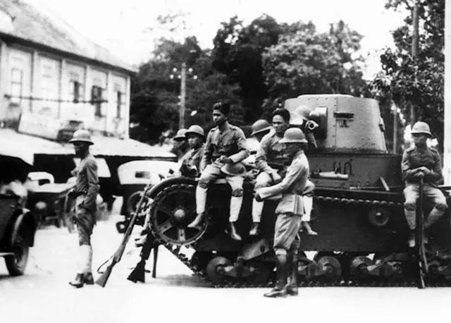 Thailand: Troops with a light tank on the streets of Bangkok after the democratic revolution or coup of 1932