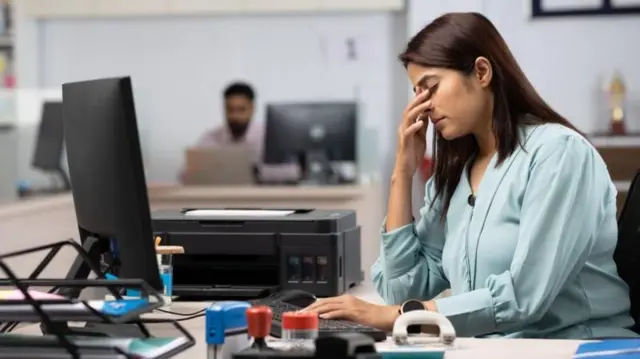 ਕੰਮ ਕਰ ਰਹੀ ਔਰਤ