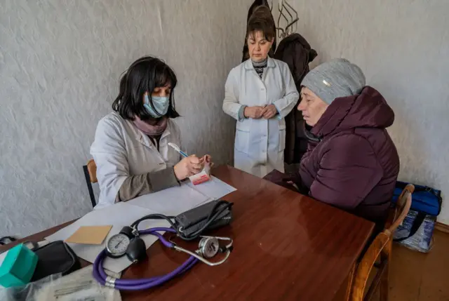 Лікар приймає пацієнта