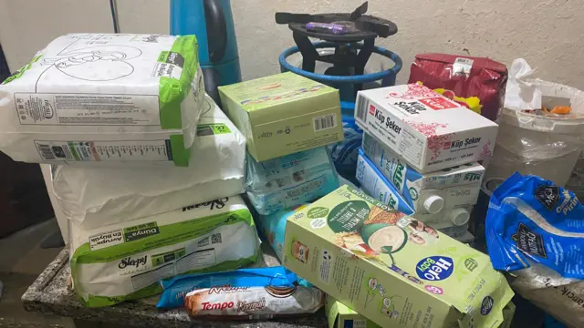 Fotos of some supplies including food wey Emmanuel give including camp gas and lighter