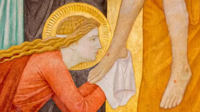 Pintura exposta em altar de Igreja em Viena, Áustria, mostra Maria Madalena beijando o pé de Jesus
