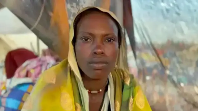 ምስ ክልተ ህጻዉንቲ ደቃ ካብ መዓስከር ዛምዛም ክትወጽእ ዝተገደደት ፋትያ መሓመድ