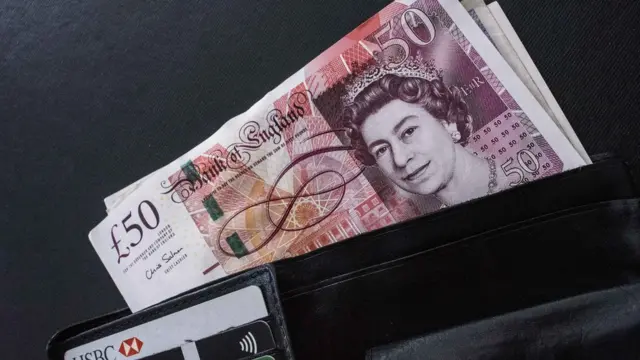 £50 notes in a wallet