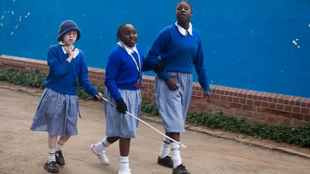 three Kenya blind school girls