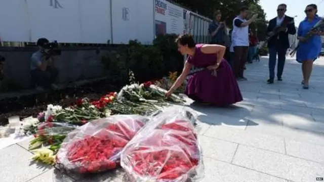 People have been laying flowers at the scene of the attack