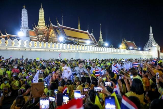 Thailand"s King Maha Vajiralongkorn and Queen Suthida greet royalists, at The Grand Palace in Bangkok, Thailand, November 1, 2020.