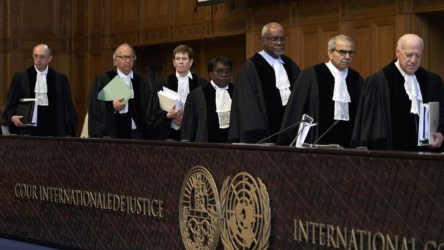 Judges take their seats at the International Court of Justice