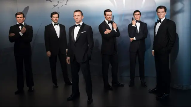 Wax figures of James Bond actors (L-R) Roger Moore, Timothy Dalton, Daniel Craig, Sean Connery, George Lazenby and Pierce Brosnan