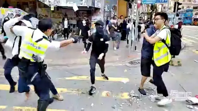 The moment before the police officer fired his first round