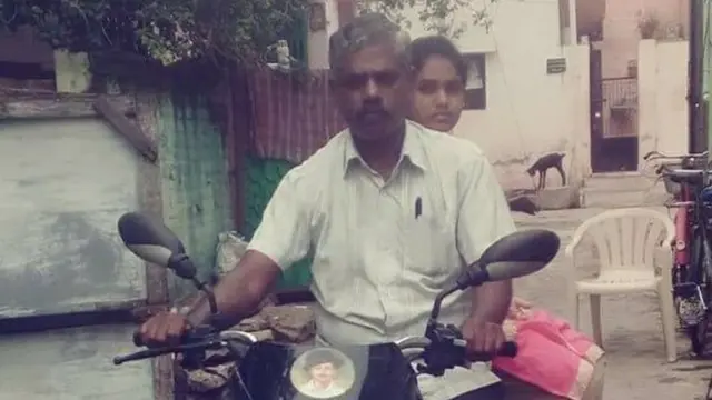 நந்தினியின் தந்தை ஆனந்தன், நந்தினி