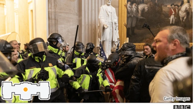 Police confront protesters at the Capitol building